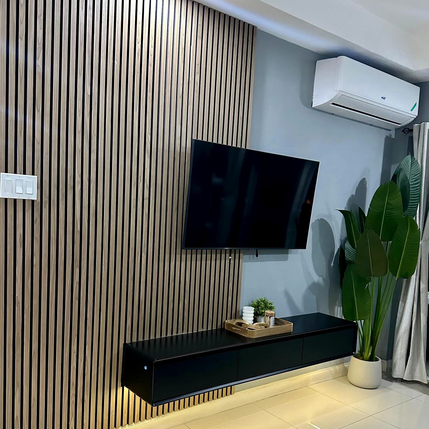 Walnut Akupanel Installed with 70 Floating Shelf