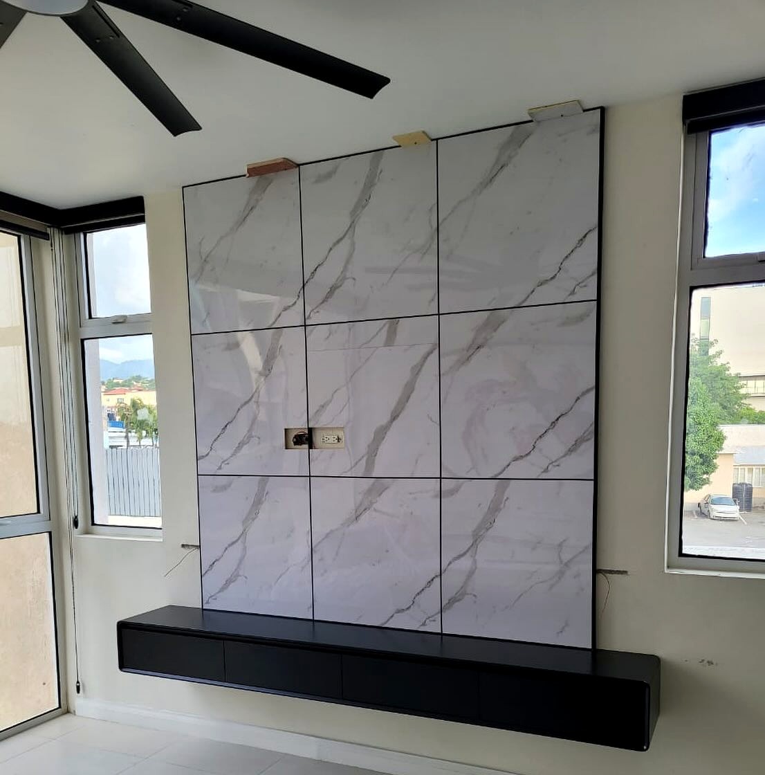 Marble Sheet Tile Design with Black 95 Floating Shelf Insta